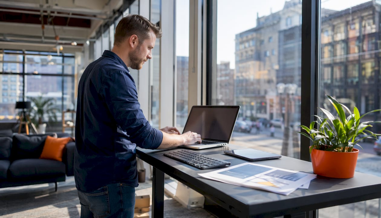 IT professional configuring cloud security in office