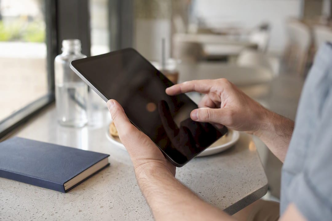 Hands activating security on smartphone device
