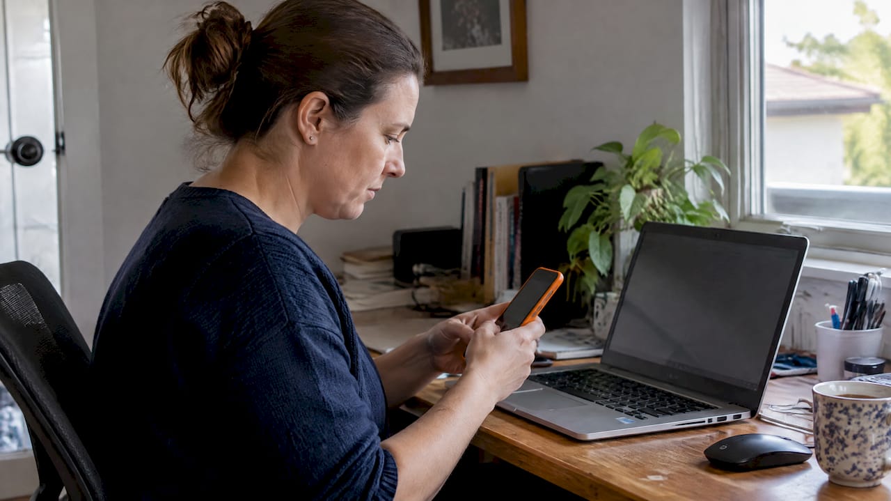 Woman setting up multi-factor authentication